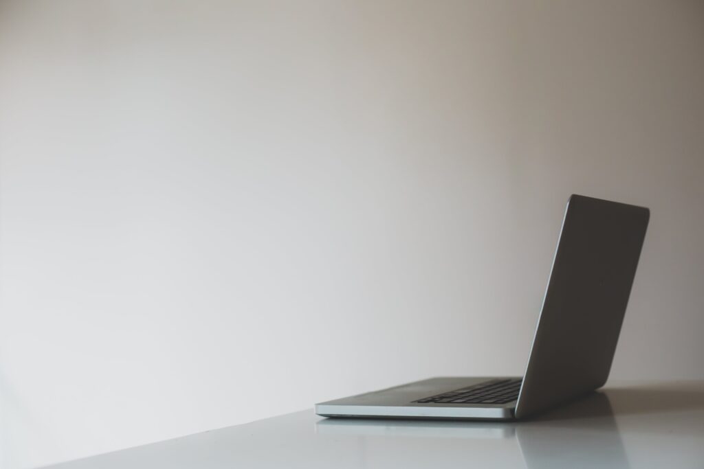 An open laptop in a bright room